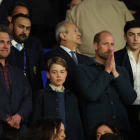 Prince George and Prince William pictured during the football match between Paris Saint-Germain and Aston Villa FC at the Parc des Princes earlier this year (Picture: Carl Recine)