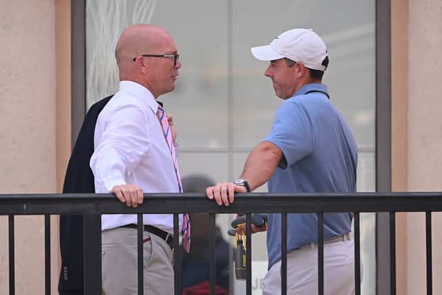Rory McIlroy chats to Guy Kinnings, the European Tour Group’s chief executive officer, outside the clubhouse at Jumeirah Golf Estates 