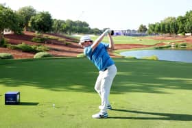 Bob MacIntyre tees off at the 18th hole on the Earth Course at Jumeirah Golf Estates in the 2022 DP World Tour Championship