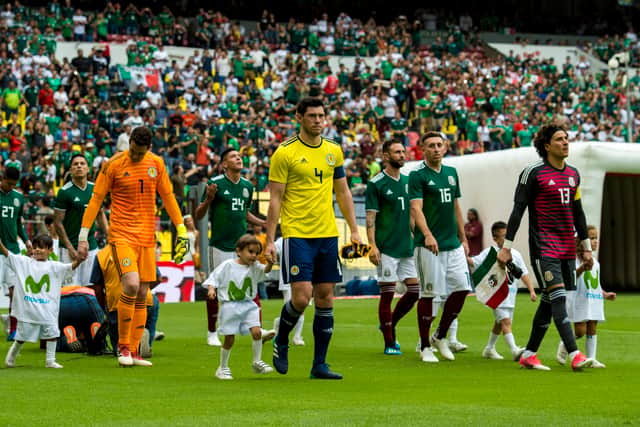 Scott McKenna leads the Scotland team out for a friendly against Mexico at the Estadio Azteca in June 2018.