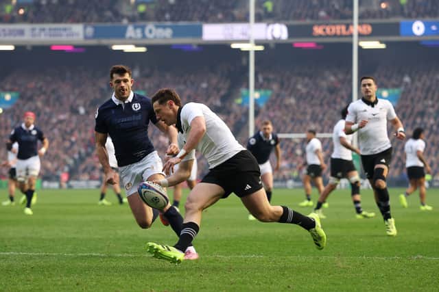 Cam Roigard scores New Zealand's first try in the win over Scotland at Murrayfield. (Photo by Stu Forster/Getty Images)