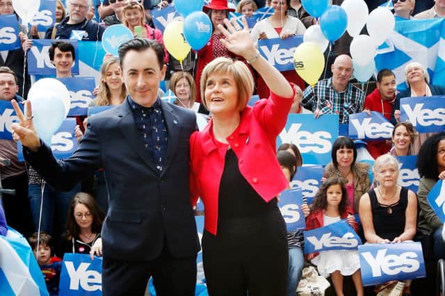 Actor Alan Cumming and Nicola Sturgeon pictured in August 2014, when she was Deputy First Minister.

 PA Photo. Photo credit should read: Danny Lawson/PA Wire