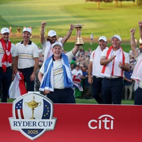 Bob MacIntyre lifts the Ryder Cup after helping Team Europe retain the trophy with a 15-13 win over Team US at Bethpage Black in New York 