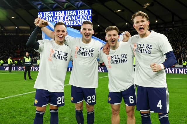 Scotland goalscorers Lawrence Shankland, Kenny McLean, Kieran Tierney and Scott McTominay celebrate qualification for the 2026 World Cup after the 4-2 win over Denmark at Hampden. (Photo by Craig Foy / SNS Group)