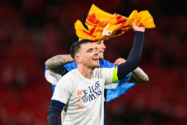 Scotland captain Andy Robertson celebrates after the 4-2 win over Denmark that sealed World Cup qualification.