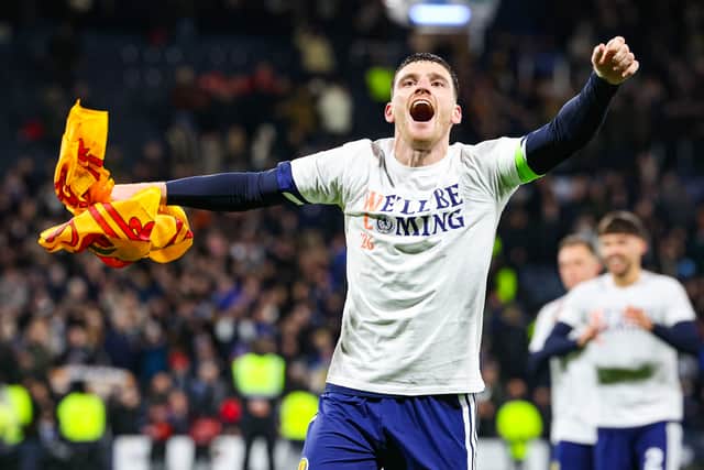 Scotland captain Andy Robertson celebrates after the 4-2 win over Denmark that clinched World Cup qualification. (Photo by Ross Parker / SNS Group)