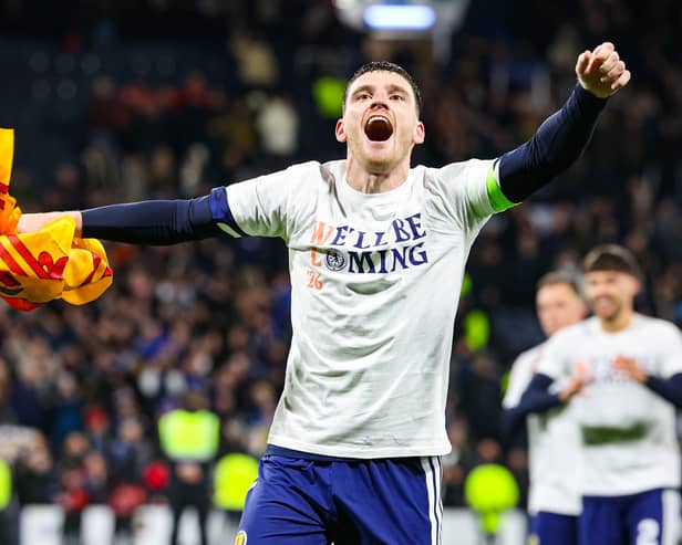 Scotland captain Andy Robertson celebrates after the 4-2 win over Denmark that clinched World Cup qualification. (Photo by Ross Parker / SNS Group)