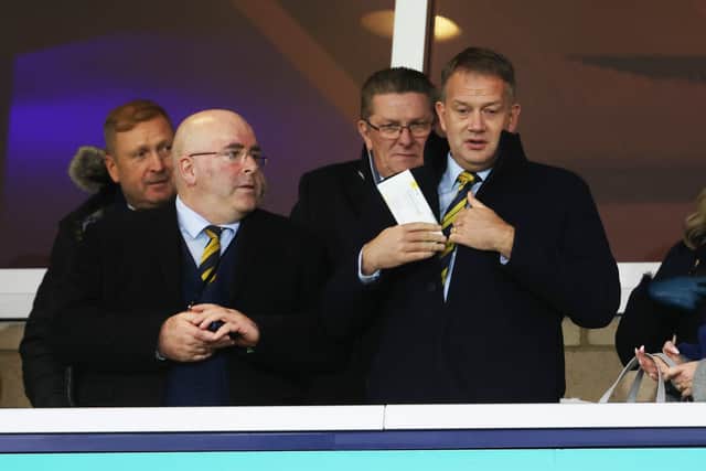 SFA chief executive Ian Maxwell, right.