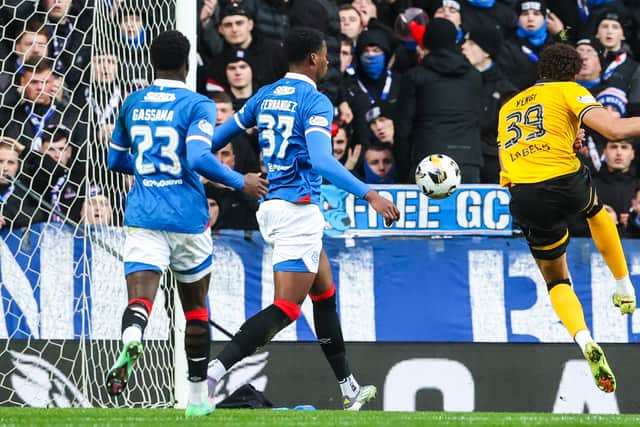 Livingston's Tete Yengi (R) has a shot at goal blocked by Rangers' Emmanuel Fernandez arm but a penalty is not given.  (Photo by Alan Harvey / SNS Group)