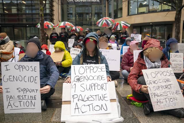 Protesters outside Queen Elizabeth House in Edinburgh
