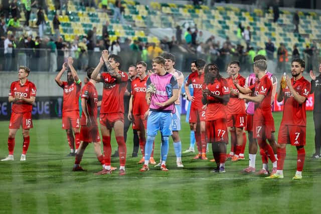The Aberdeen squad applaud the fans at full time after the goalless draw with AEK Larnaca. (Photo by Sakis Savvides / SNS Group)