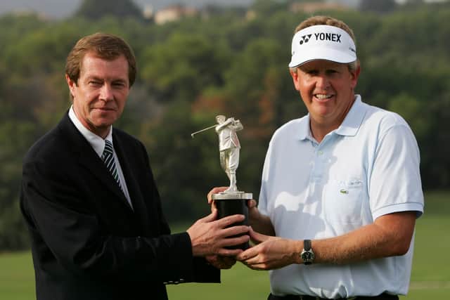 Colin Montgomerie is presented with the Harry Vardon Trophy for an eight time in 2015 by George O'Grady, then Executive Director of the European Tour, at the end of the Volvo Masters at the Valderrama in Spain