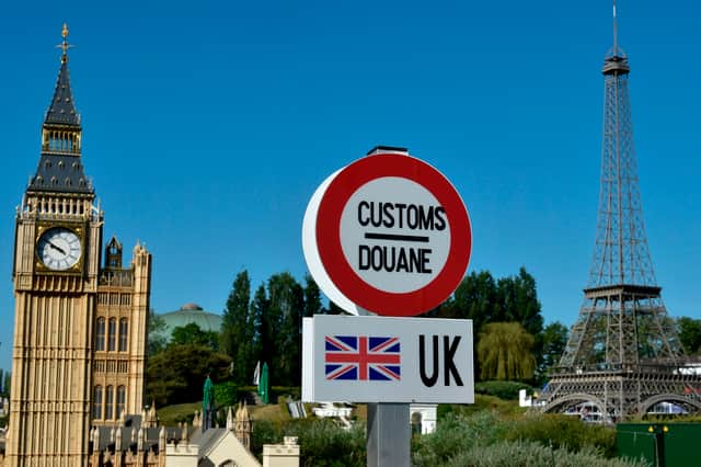 A customs road sign is seen at the border of the United Kingdom, with a model of Big Ben, and France, with a model of the Eiffel Tower, in the 'Mini-Europe' theme park in Brussels (Picture: John Thys)