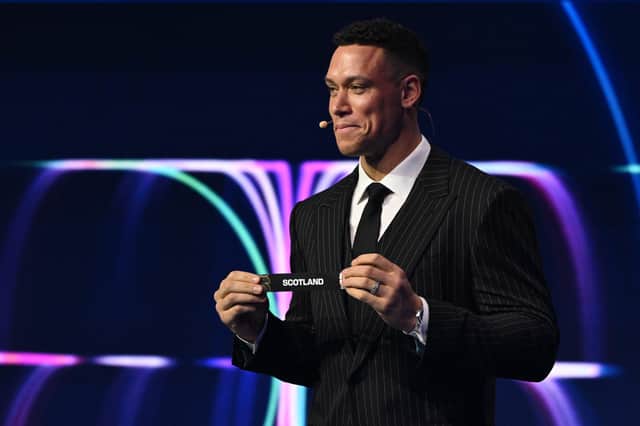 Baseball star Aaron Judge pulls Scotland's name out of the hat at the World Cup draw.