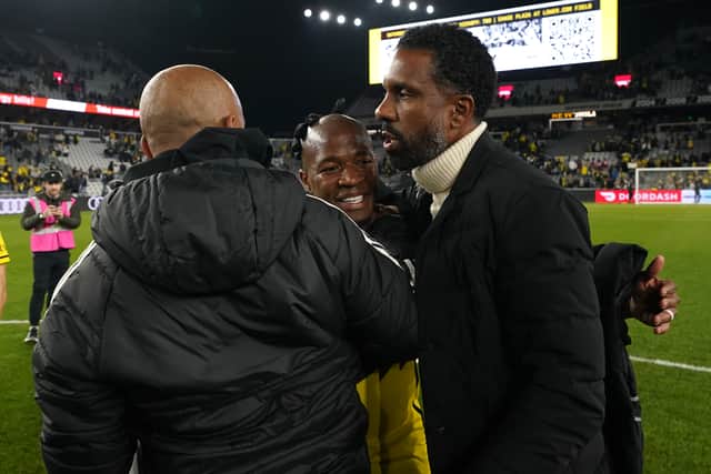 Wilfried Nancy embraces his Columbus Crew skipper Darlington Nagbe.