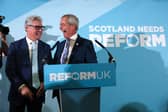 Reform UK leader Nigel Farage with new party member Malcolm Offord at a rally on Saturday in Falkirk (Picture: Jeff J Mitchell)