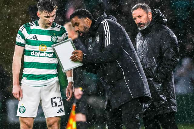 Celtic manager Wilfried Nancy issues instructions to Kieran Tierney as Hearts head coach Derek McInnes looks on. (Photo by Craig Williamson / SNS Group)