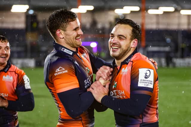 Edinburgh's James Lang (L) and Wes Goosen celebrate at full time following the win over Toulon in the Investec Champions Cup at Hive Stadium.