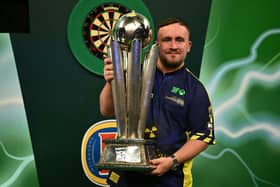 Luke Littler is the defending world darts champion.