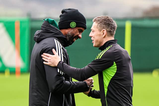 Celtic manager Wilfried Nancy and captain Callum McGregor shake hands during a training session. (Photo by Ross MacDonald / SNS Group)