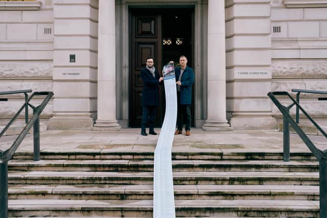 Russell Borthwick from Aberdeen and Grampian Chamber of Commerce and Ben Martin from the British Chamber of Commerce delivering the letter to HM Treasury.