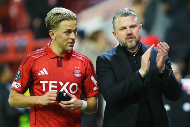 Aberdeen winger Jesper Karlsson and his manager Jimmy Thelin.