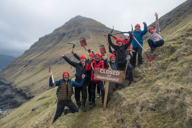 A group of 'voluntourists' helping with a maintenance project in the Faroe Islands