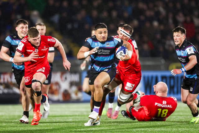 Glasgow Warriors' Sione Tuipulotu on the attack against Stade Toulousain at Scotstoun.