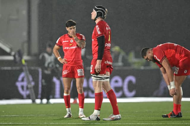Toulouse players react at the final whistle after losing in the European Champions Cup to Glasgow Warriors at Scotstoun Stadium.