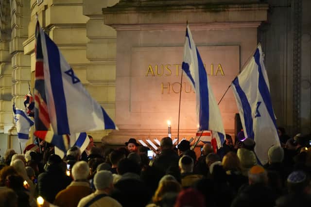 People held a vigil outside the Australian High Commission in central London on Sunday