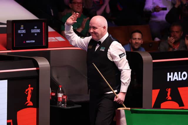 John Higgins has got off to a winning start at the Scottish Open snooker.
