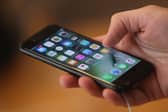 Smartphones and their enticing apps can be hard to resist (Picture: Sean Gallup)