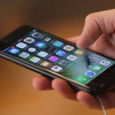 Smartphones and their enticing apps can be hard to resist (Picture: Sean Gallup)