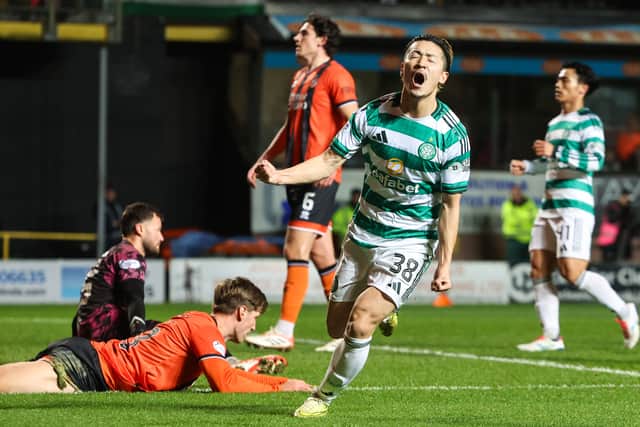 Daizen Maeda celebrates scoring to make it 1-0 to Celtic over Dundee United at Tannadice Park. (Photo by Ross MacDonald / SNS Group)