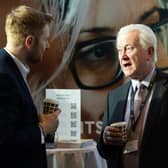 Richard Watkins, certified financial planner with Continuum (right)