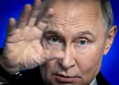 Vladimir Putin is a warmongering dictator (Picture: Alexander Nemenov)