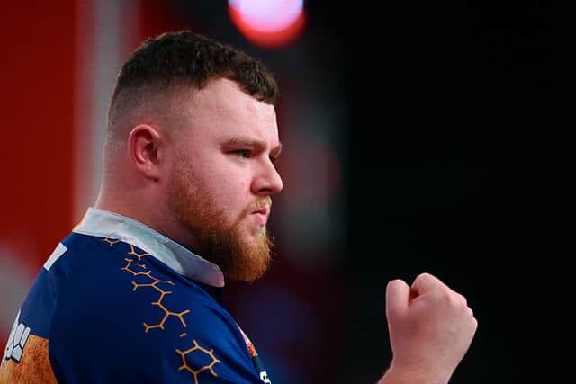 Josh Rock is in first round action today at the World Darts Championship.