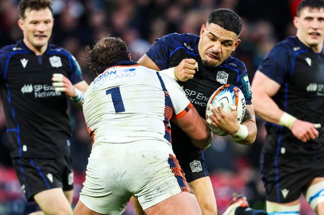 Glasgow's Sione Tuipulotu and Edinburgh's Pierre Schoema lock horns in the 1872 Cup first leg at Hampden. (Photo by Ross MacDonald / SNS Group)