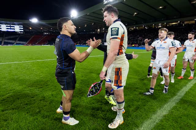 Edinburgh's Grant Gilchrist shakes hands with Warriors' Sione Tuipulotu after the 1872 Cup match at Hampden. (Photo by Ross MacDonald / SNS Group)