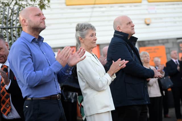 Doris McLean (centre) is pictured as Jim McLean's statue is unveiled in September 2021 outside Tannadice.