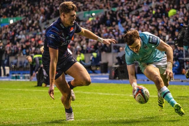 Glasgow's Jamie Dobie scores the second of his two tries in the 21-3 win over Edinburgh.
