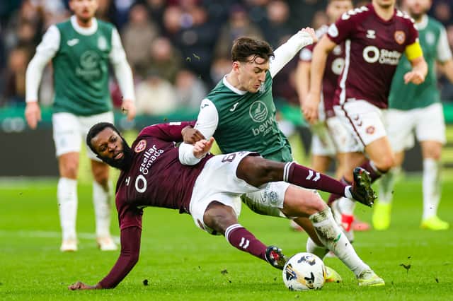 Hibs' Josh Campbell (right) challenges Hearts' Beni Baningime during the Edinburgh derby at Easter Road. (Photo by Roddy Scott / SNS Group)