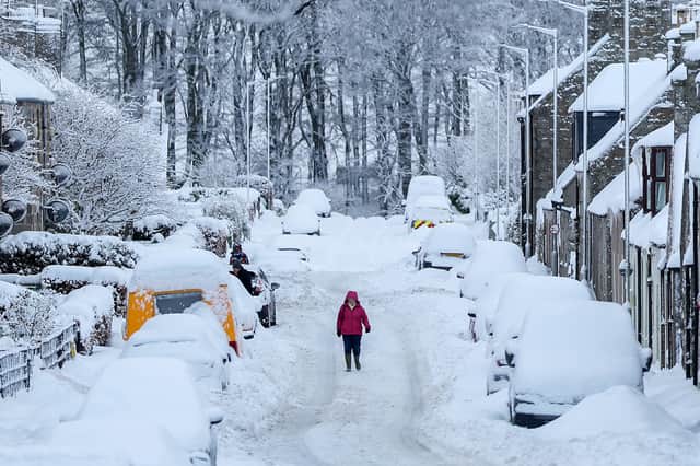 Heavy snow in Huntly forced pedestrians to walk on roads instead of pavements on Monday