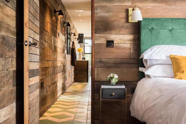 The reclaimed marine furniture nods to Falmouth’s seafaring heritage.
