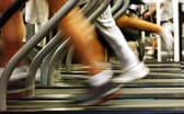 Exercising in a gym is one way to keep fit, but a brisk walk can have surprisingly beneficial effects too (Picture: Spencer Platt)
