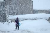 Person walking in Alford, a large village in Aberdeenshire, on Tuesday 