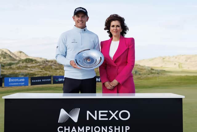 Nexo Championship winner Grant Forrest pictured with Sarah Malone, executive vice president of Trump International