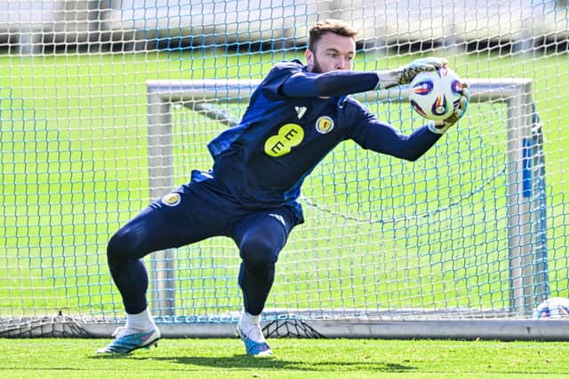 Hearts and Scotland goalkeeper Zander Clark has joined Doncaster Rovers on loan.