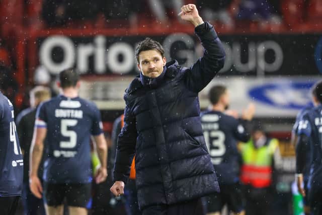Danny Rohl salutes the Rangers fans after the win over Aberdeen.