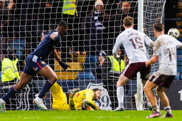Dundee striker Emile Acquah thought he had scored - but Hearts keeper Craig Gordon had other ideas.